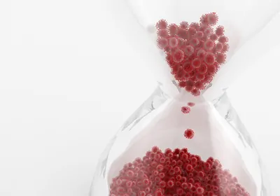 hourglass with coronaviruses instead of sand
